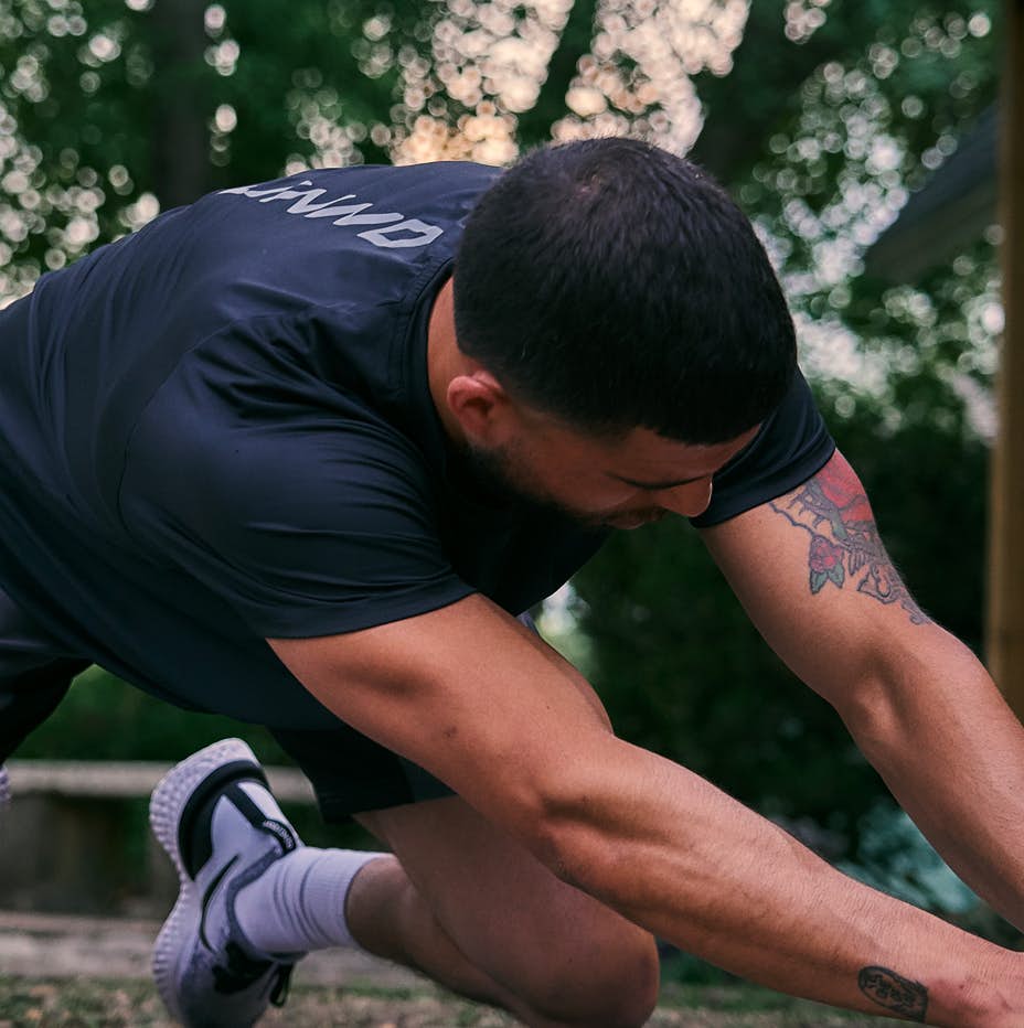 Man stretching on ground