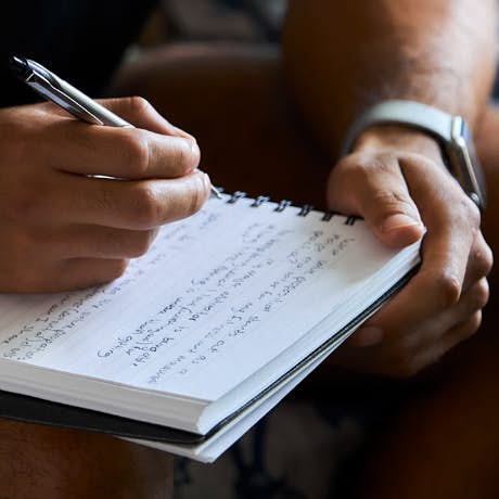 Person taking notes.