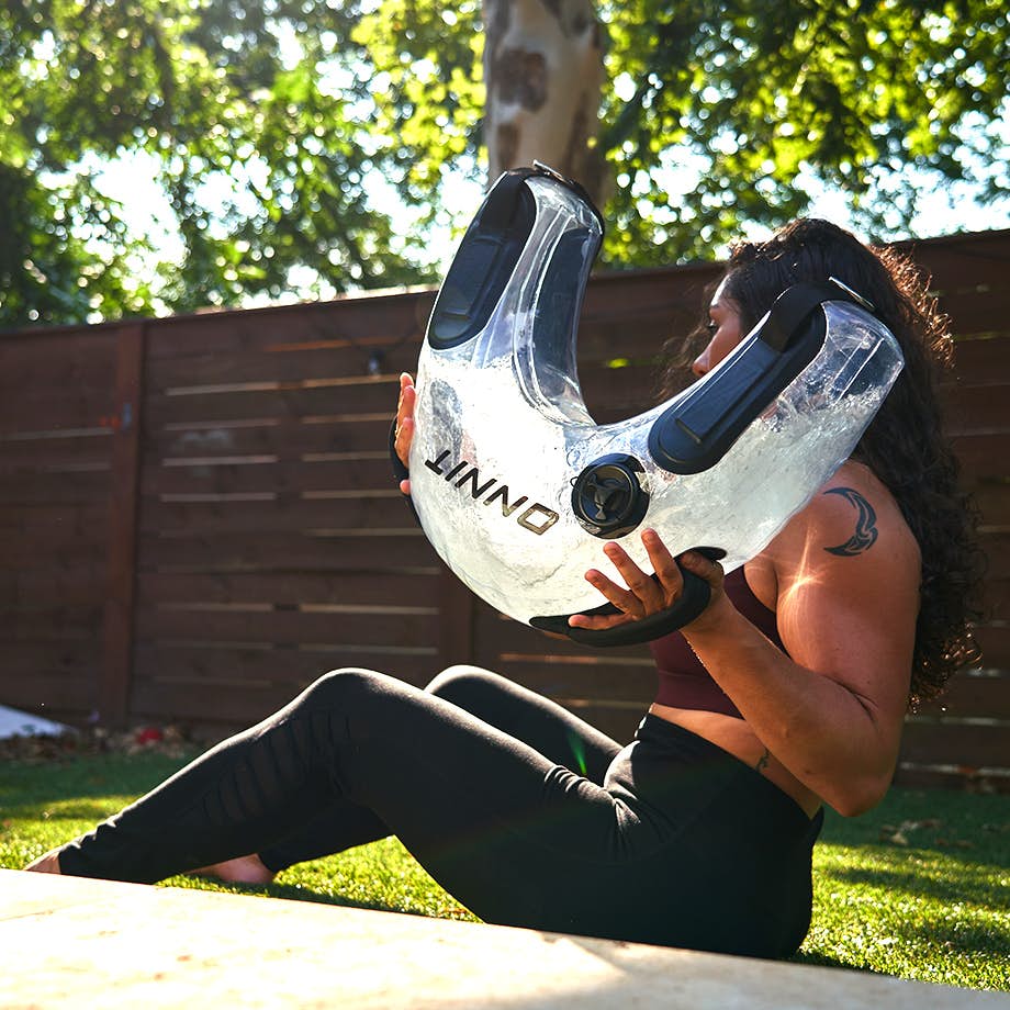 Woman using Hydrocore Bag for ab exercise