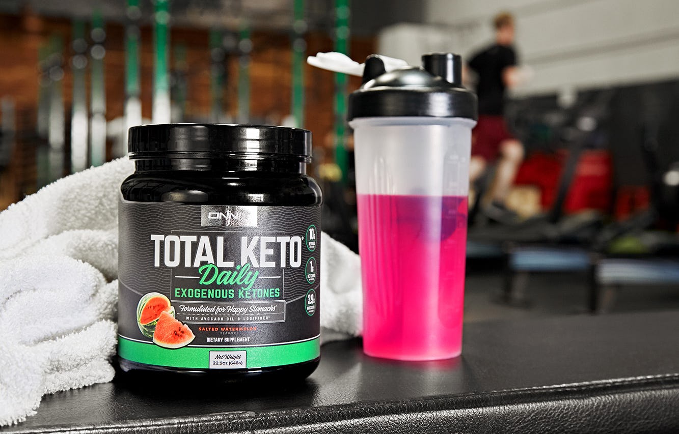 Total Keto Daily at the gym with a shaker bottle