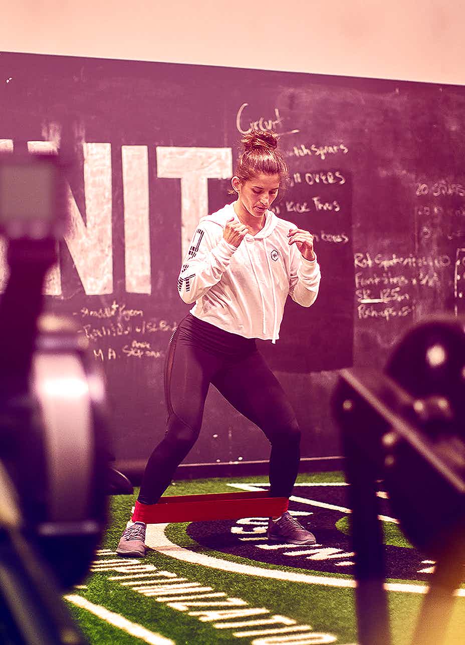 Female Athlete Training with resistance band